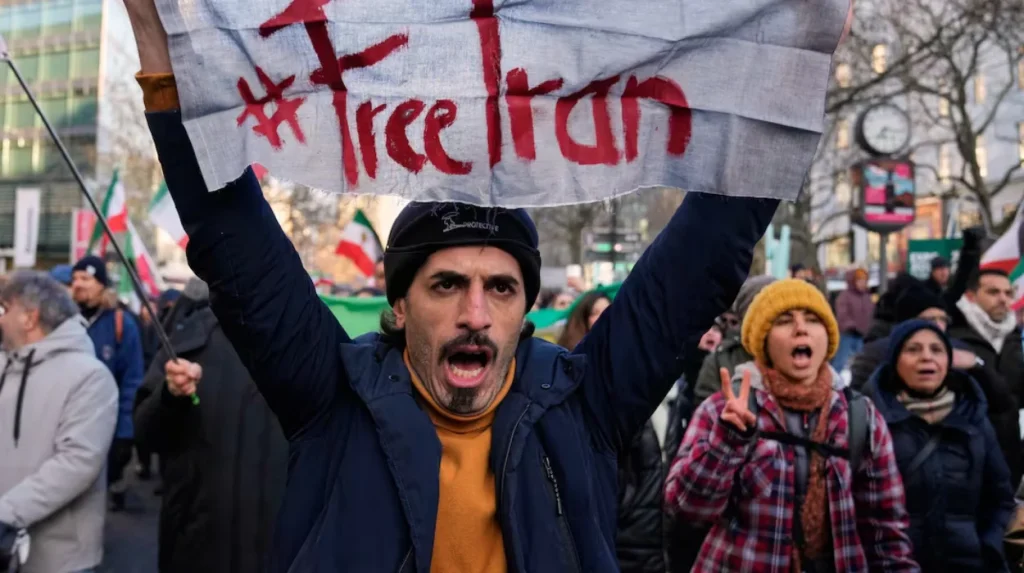 Iran threatens retaliation against US as protest death toll mounts